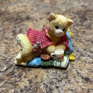 Charming Cat Figurine with Pink Sweater